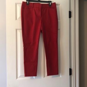 Red skinny pants.
